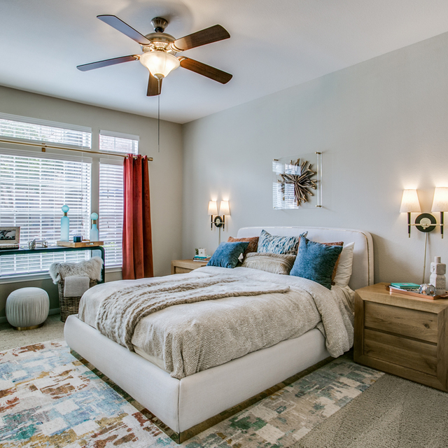 The Gael - bedroom with huge bright windows with comfortable bed
