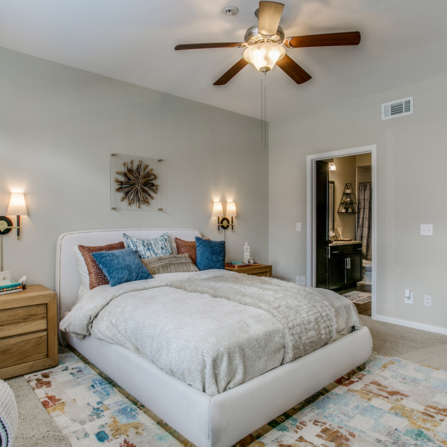 The Gael - bedroom with huge bright windows with comfortable bed